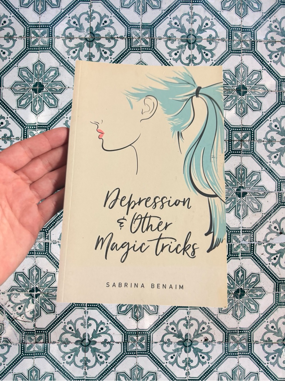Sabrina Benaim’s “Depression & Other Magic Tricks” Paperback Book